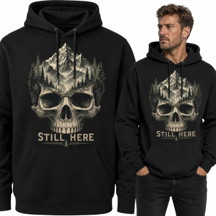 Bluza męska z kapturem - czaszka z górskimi szczytami i lasem „Still here”